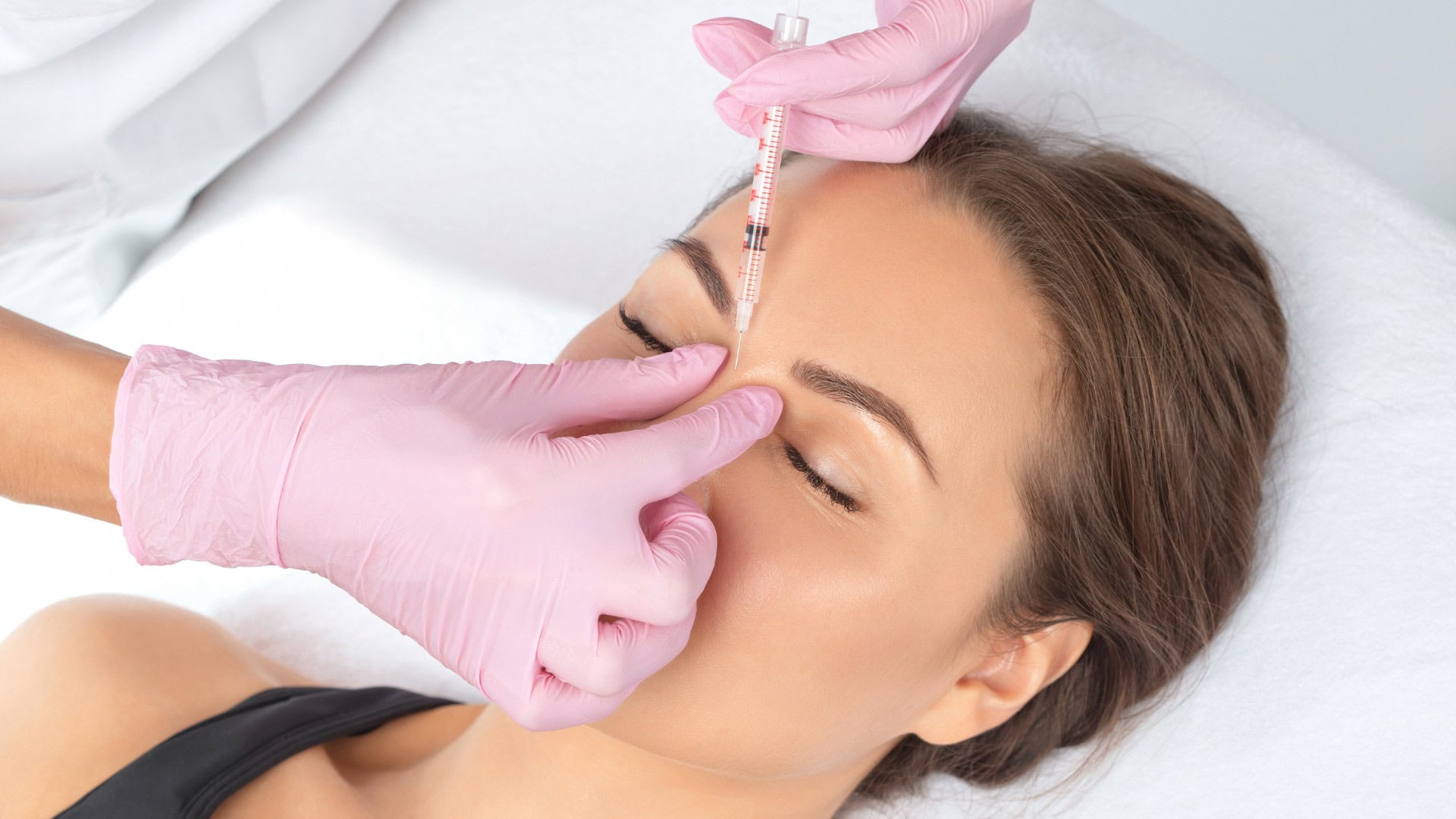 Woman getting aesthetic treatment